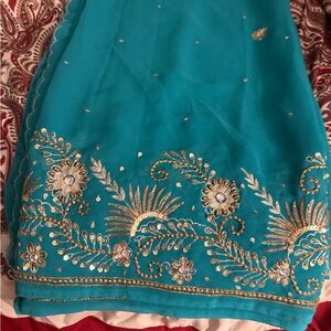 Elegant Teal Embroidered Women's Saree with fall  stitched blouse and petticoat.